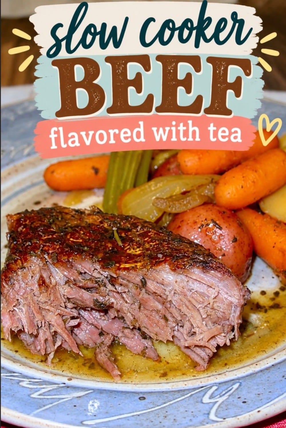 A plate with a slice of slow-cooked beef, carrots, potatoes, and celery. Text above reads, Winter Pot Roast: Slow cooker beef flavored with tea in colorful, decorative fonts—your new favorite beef roast recipe for cozy nights. A plate with a slice of slow-cooked beef, carrots, potatoes, and celery. Text above reads, Winter Pot Roast: Slow cooker beef flavored with tea in colorful, decorative fonts—your new favorite beef roast recipe for cozy nights.
