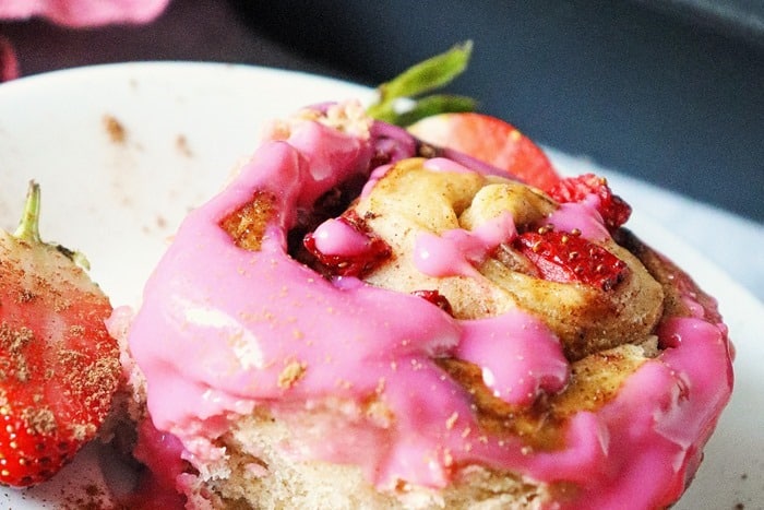 Valentine cinnamon roll with pink icing