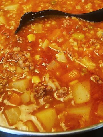 ground beef vegetable soup with diced potatoes and seasonings