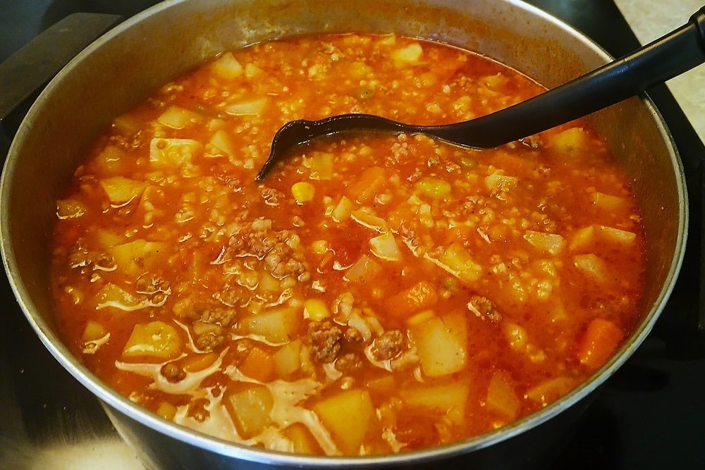 homemade hamburger vegetable soup with diced potatoes