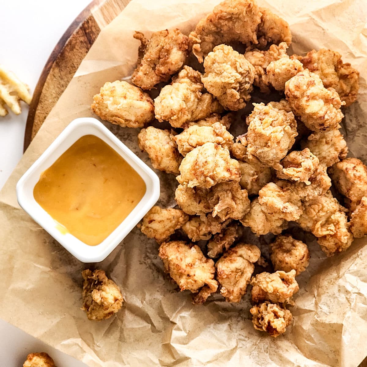 Copycat Chick Fil A Nuggets with honey mustard sauce