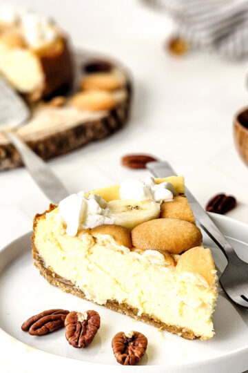 Banana Pudding Cheesecake sliced on white dish