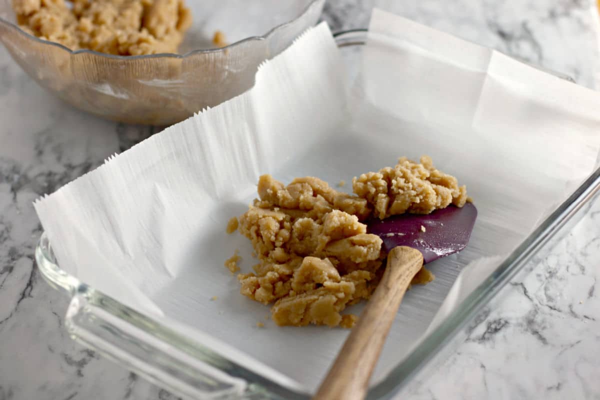 placing dough on parchment paper