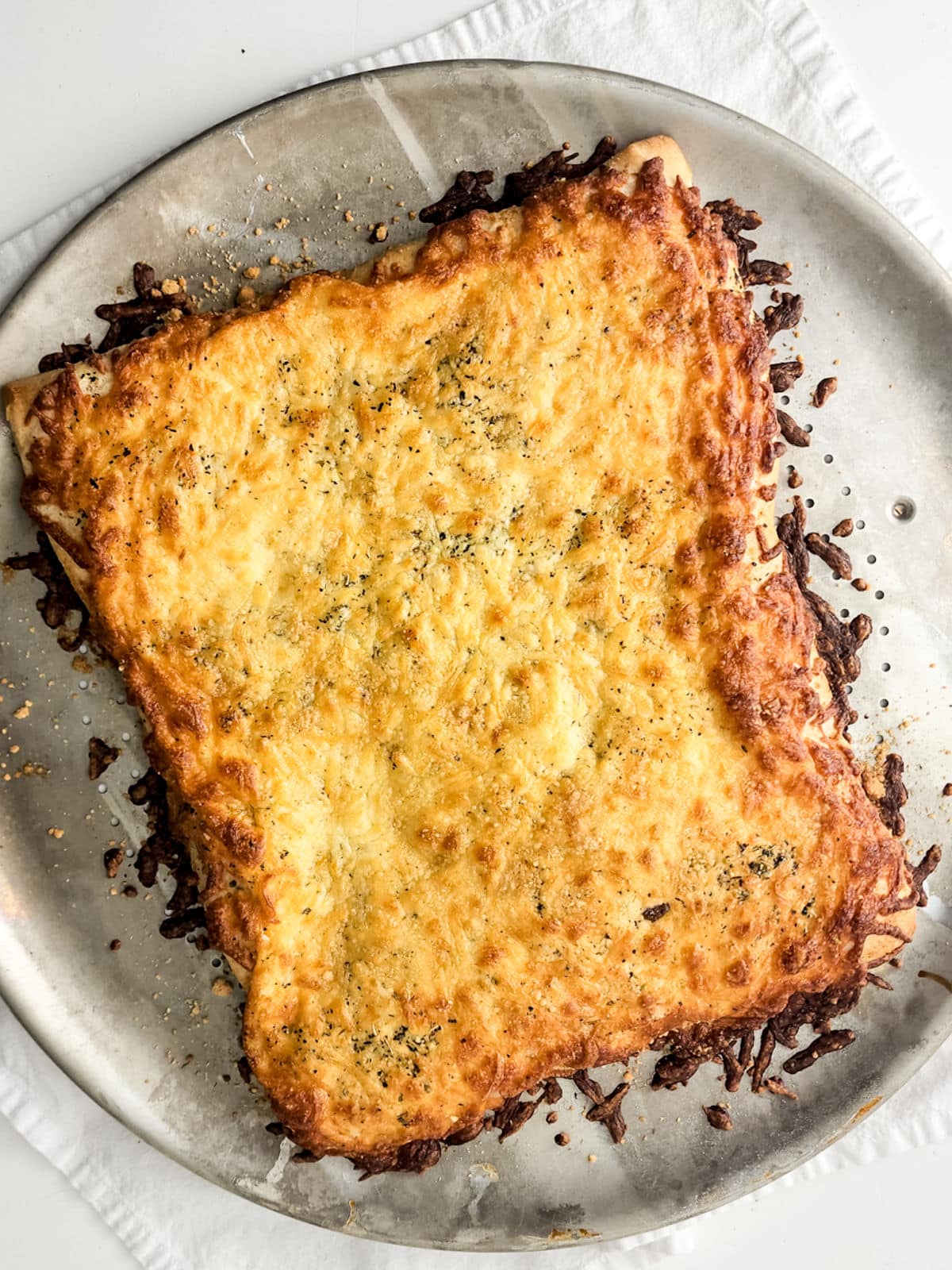 removing cheese sticks from oven