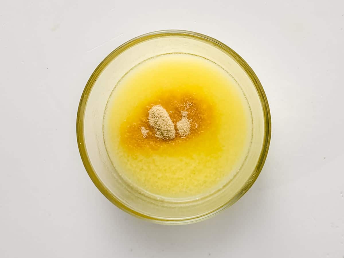 mixing garlic and butter