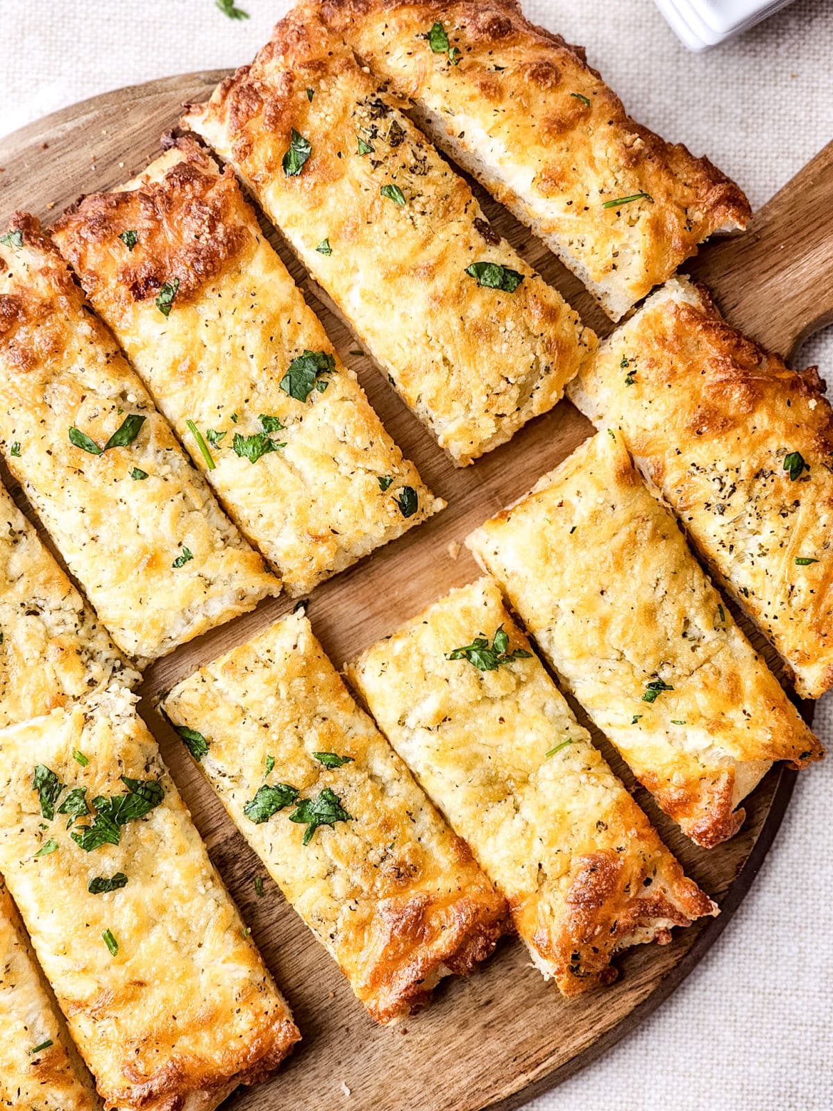cut cheese sticks on board