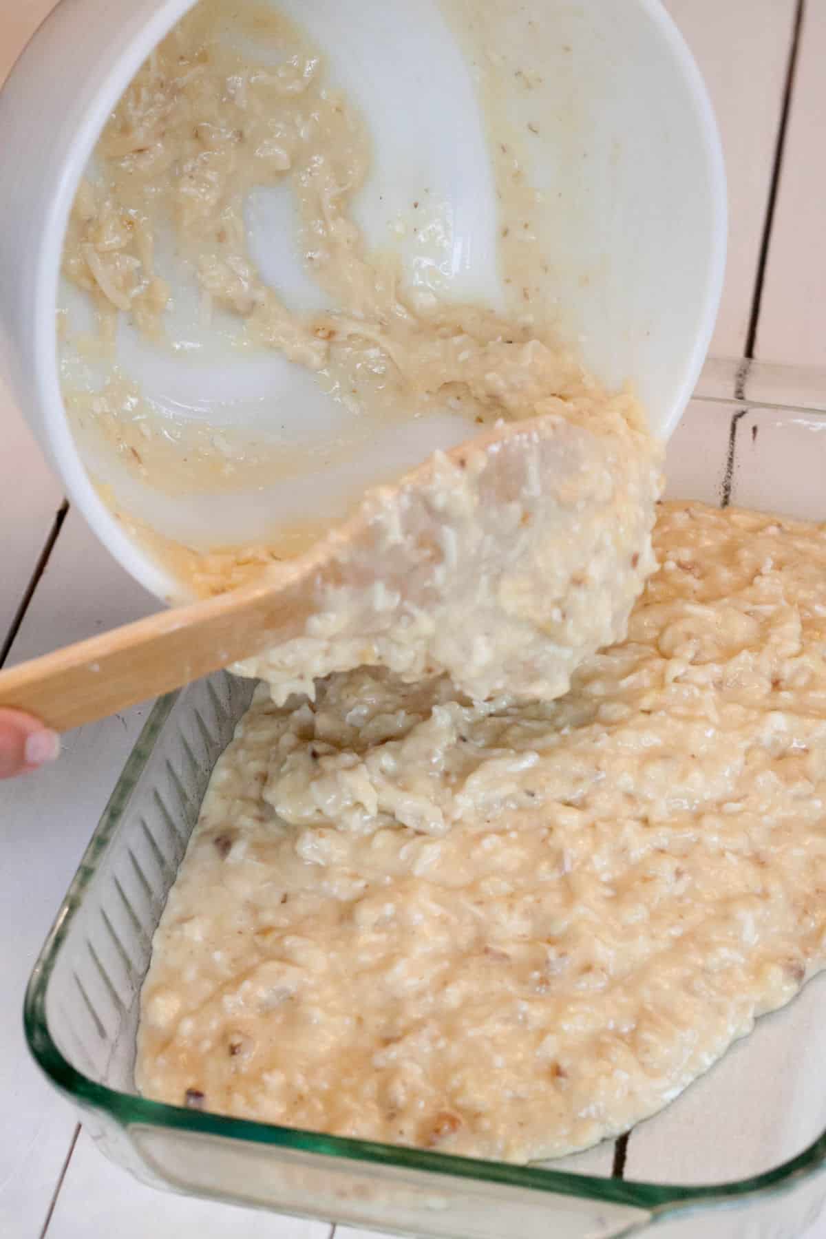 pouring cake into dish