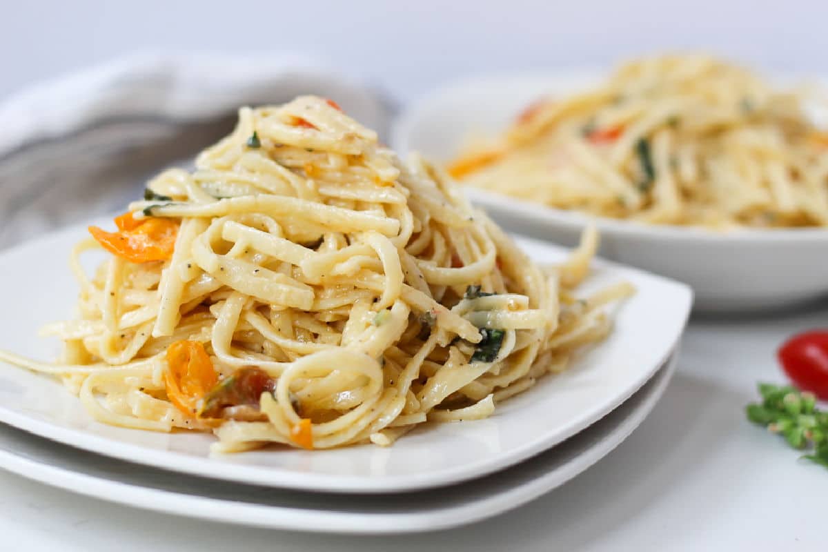 top view of delicious linguine on white plate