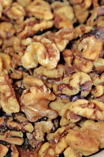 toast walnuts in the oven with a light coating of butter and salt