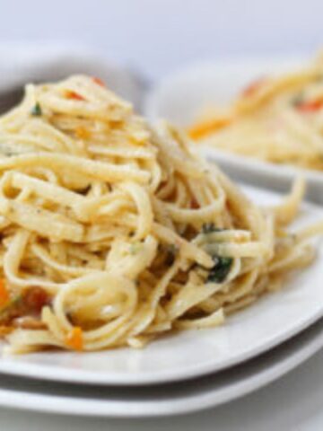 top view of linguine on white plate