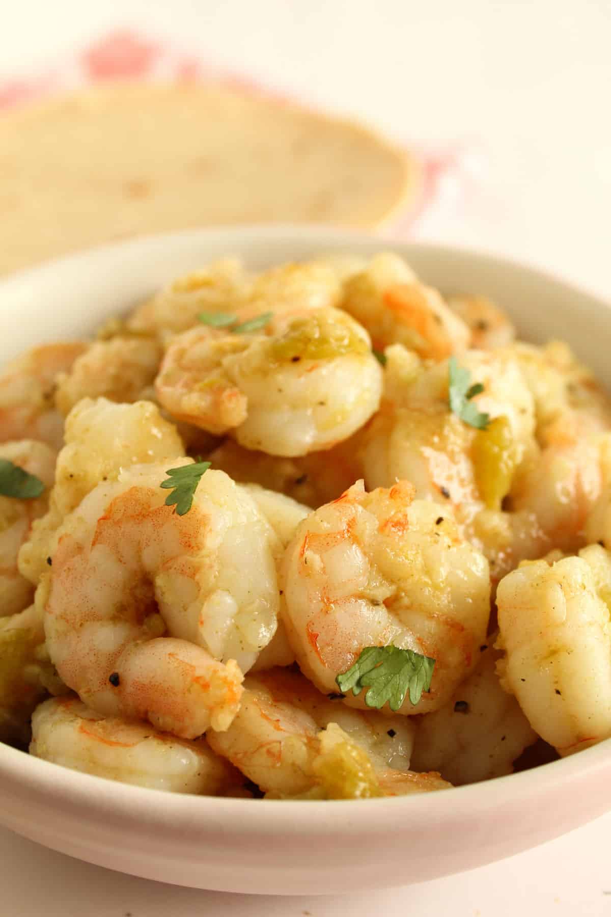 close up of cooked shrimp with parsley
