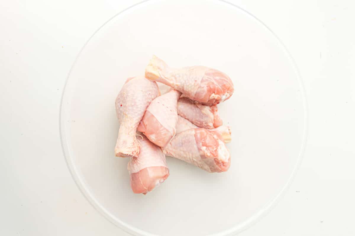drumsticks placed in mixing bowl