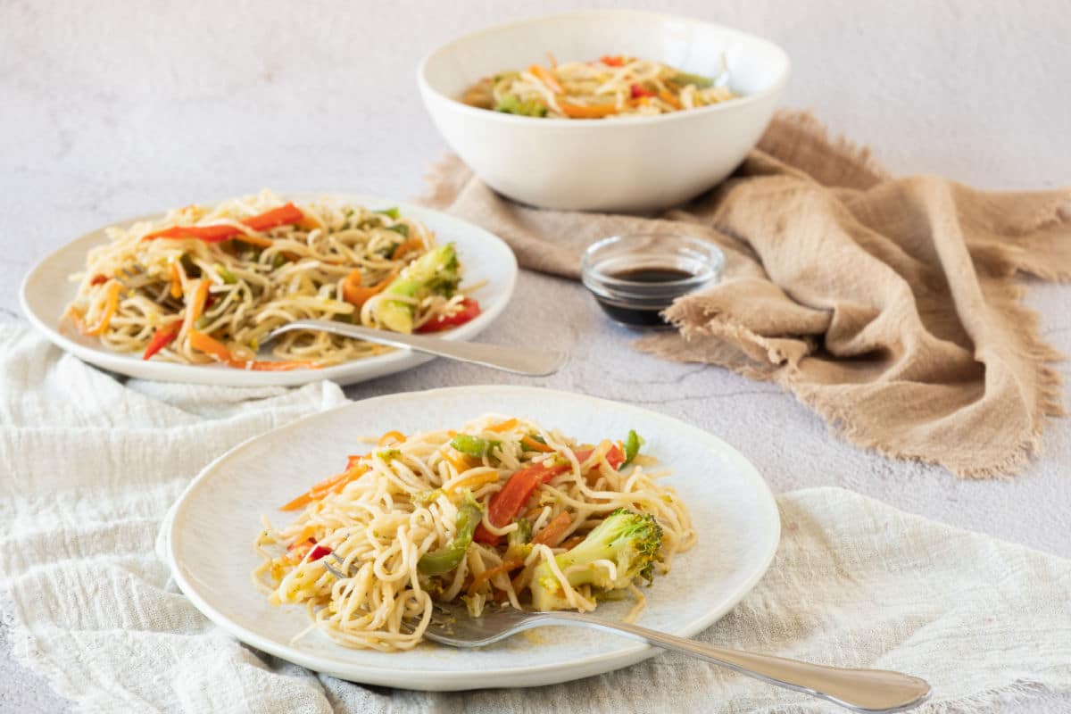 vegetable mein on white plates