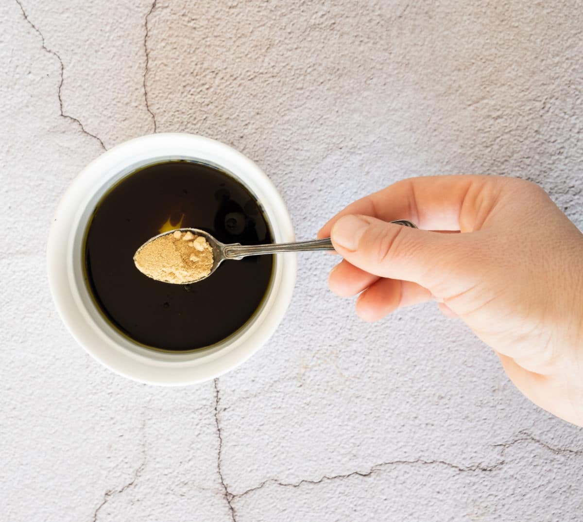 mixing soy sauce and garlic