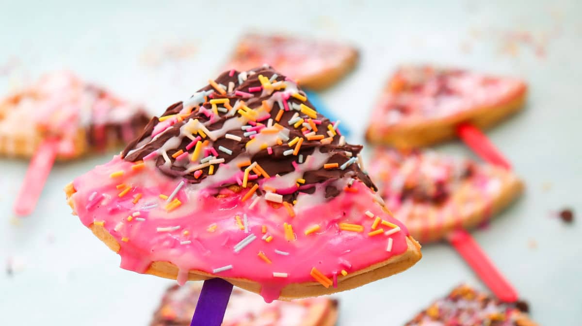 close up of waffle pops with glaze and sprinkles
