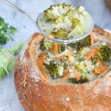 top view of Broccoli Cheddar Cheese Soup in bread bowl