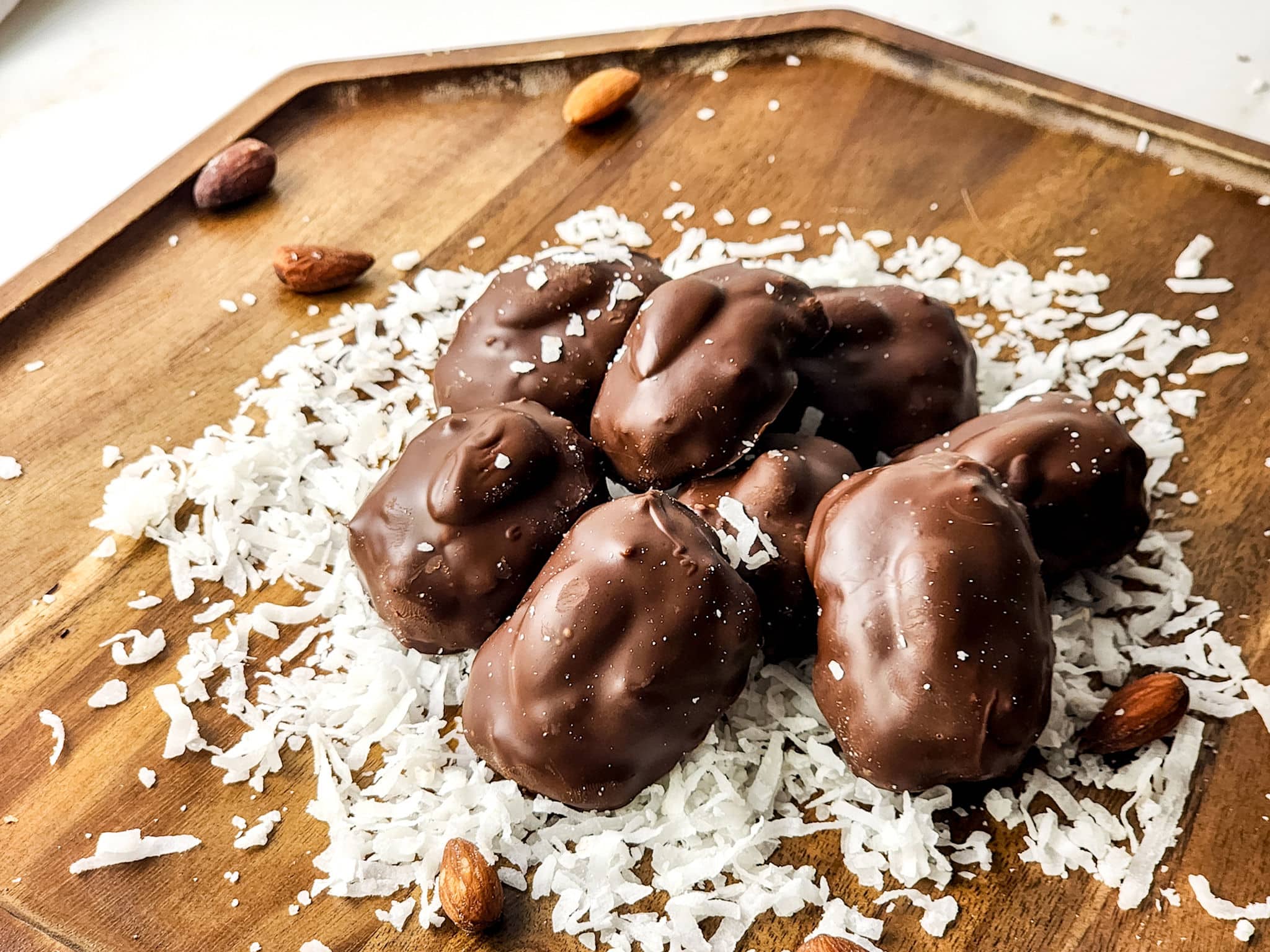 almond joy bites on wood board