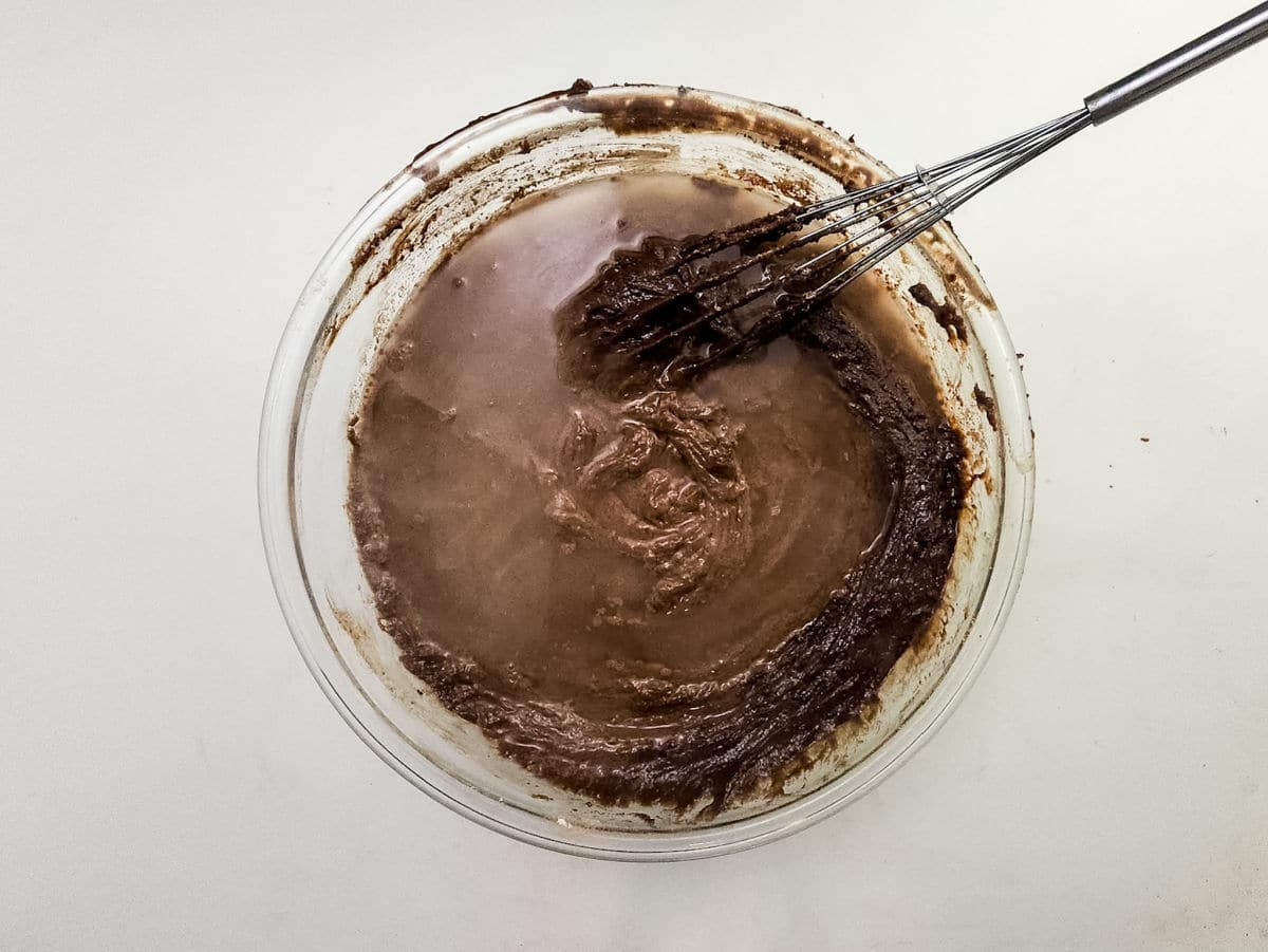 mixing chocolate frosting