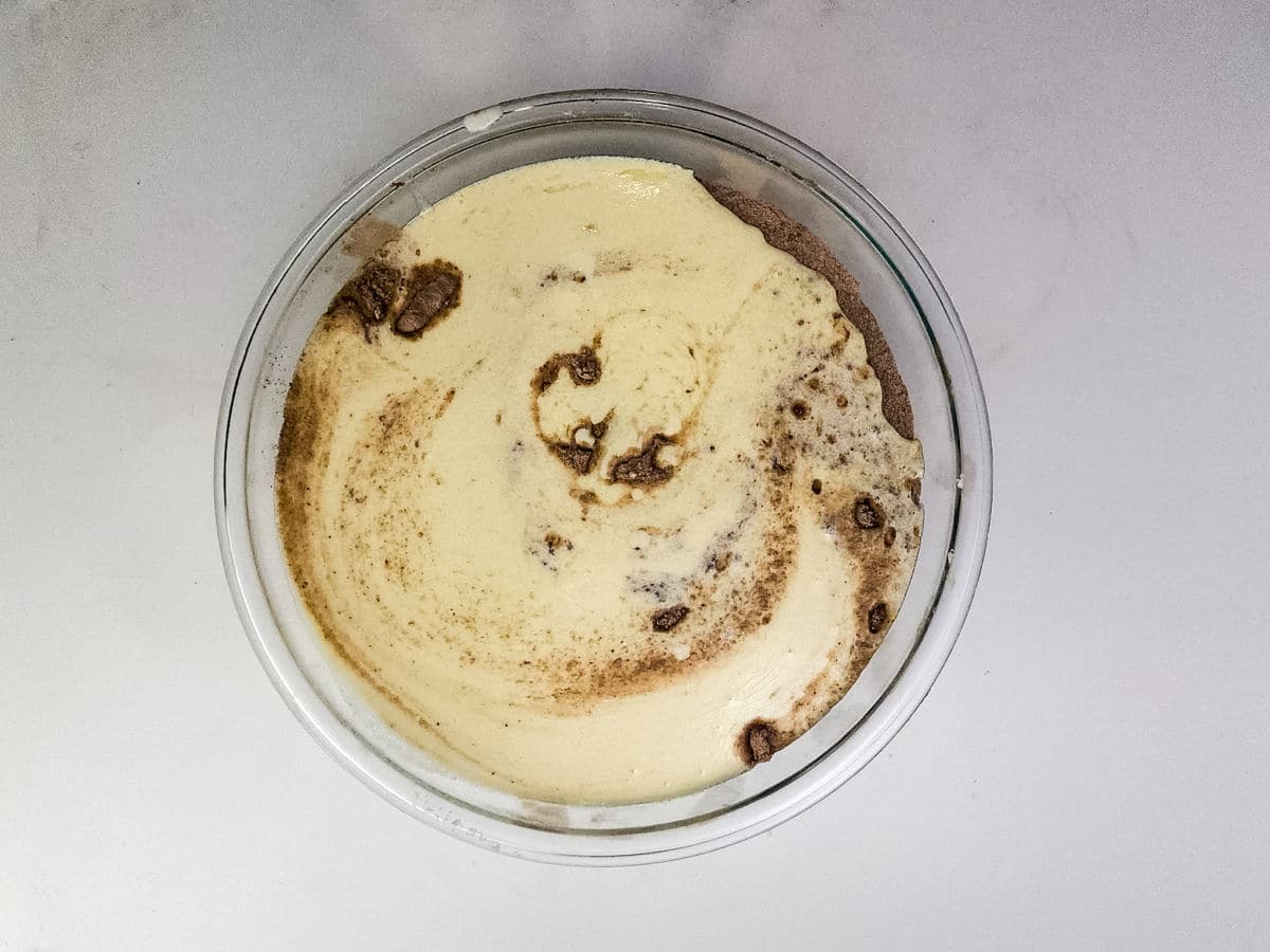 spreading cake soak over cooled cake