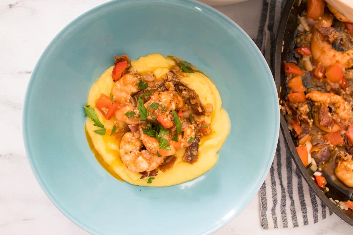 shrimp and grits in blue bowl