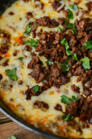 Queso Fundido feature image top view in cast iron pan