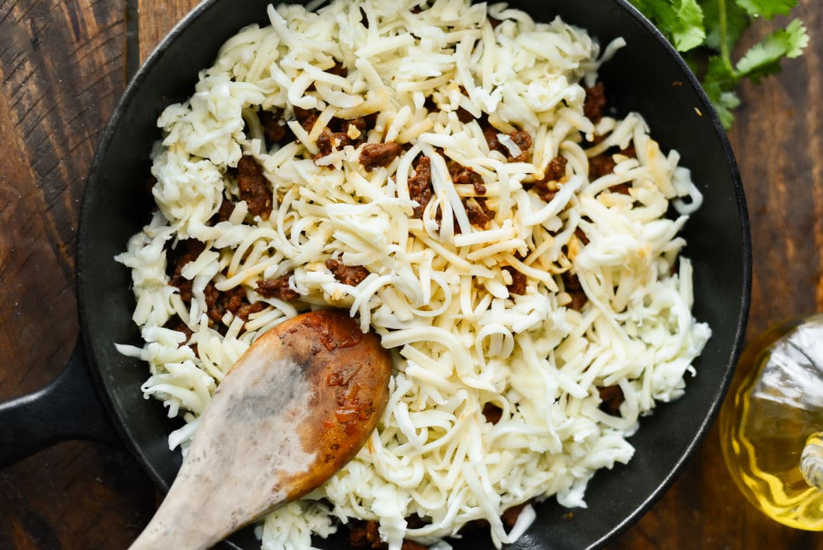 blending cheeses with chorizo