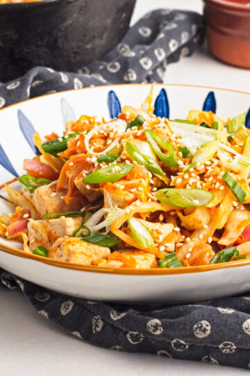 vegan egg roll bowl in blue and white bowl