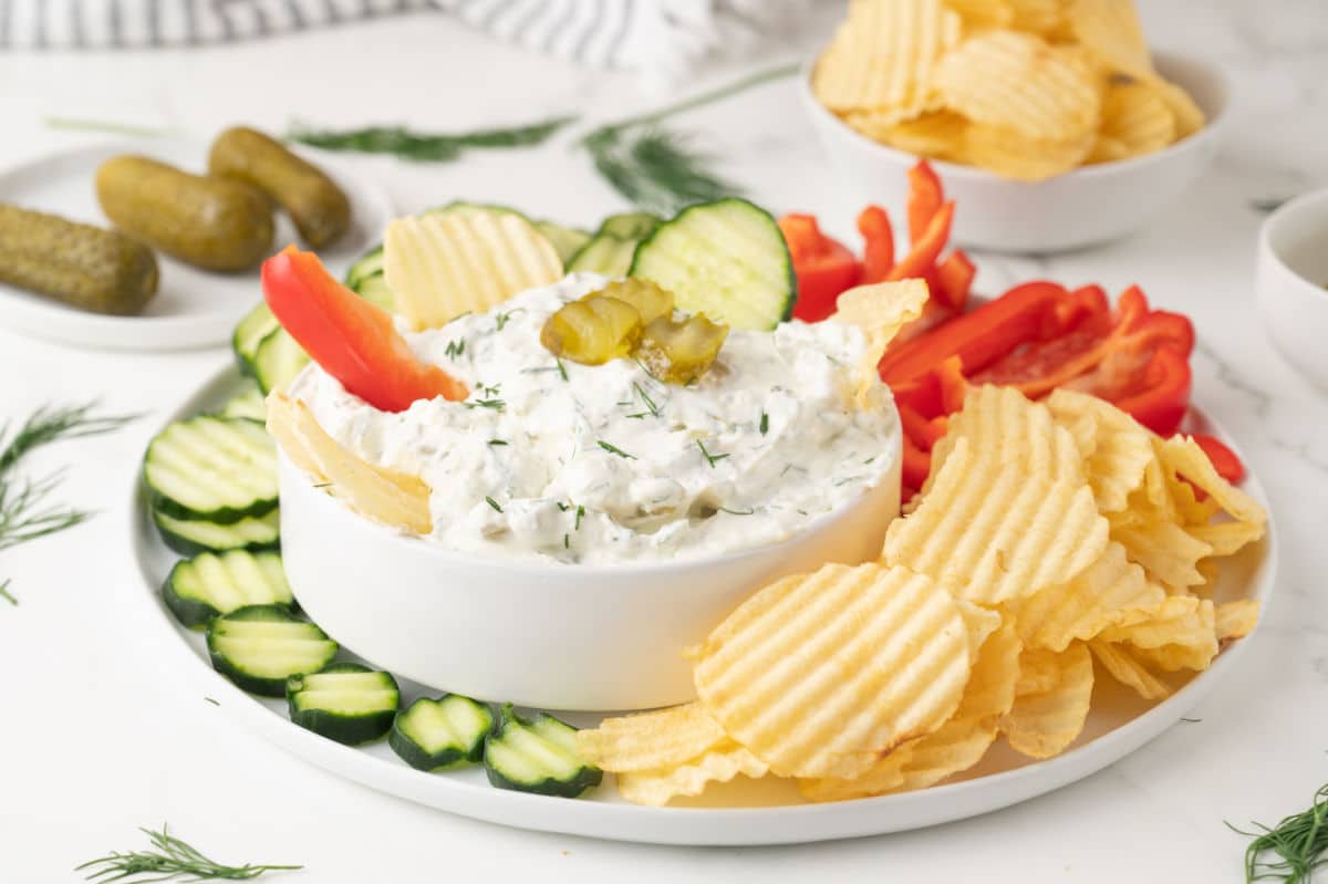 dill pickle dip served on platter with dippers