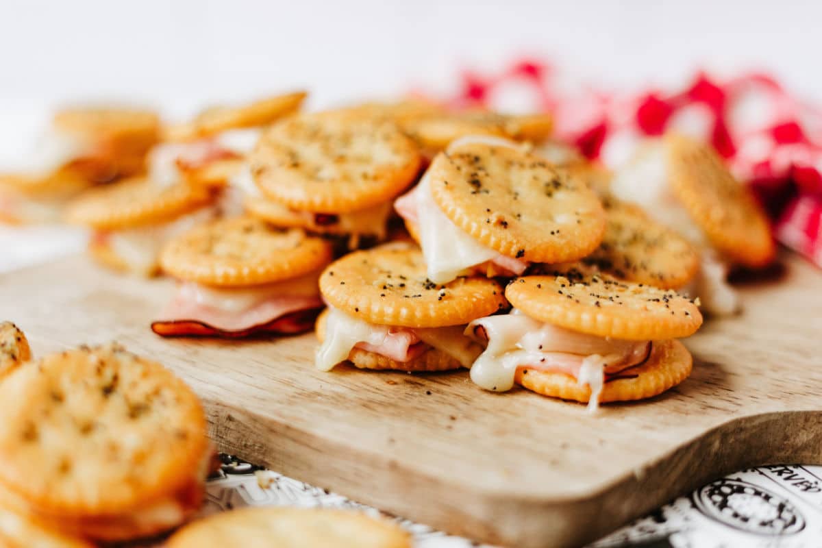 serving ritz party crackers with ham and cheese after baking