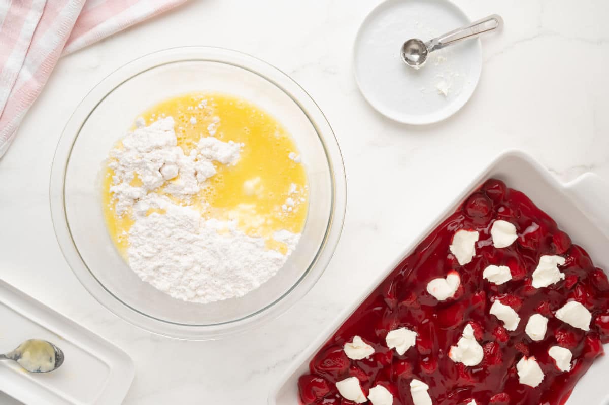 cake mix and melted butter in a large bowl
