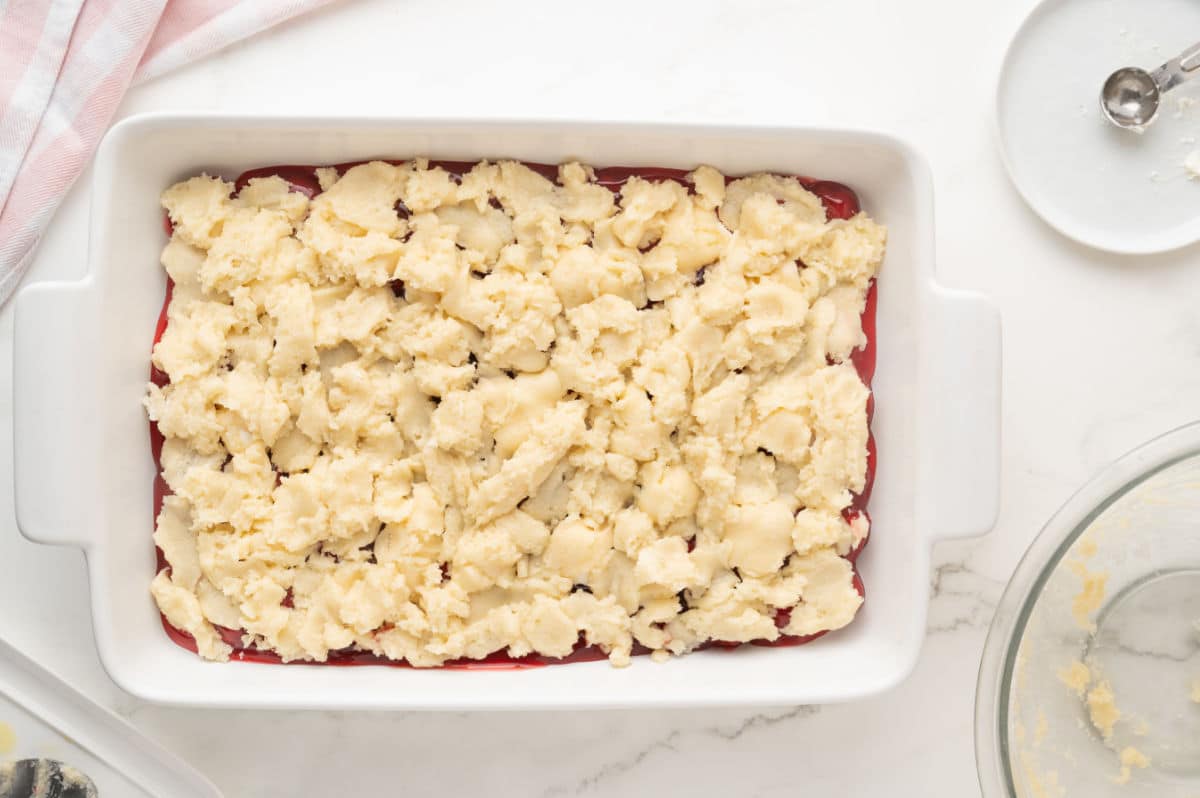 cake mix sprinkled on top of the filling & cream cheese