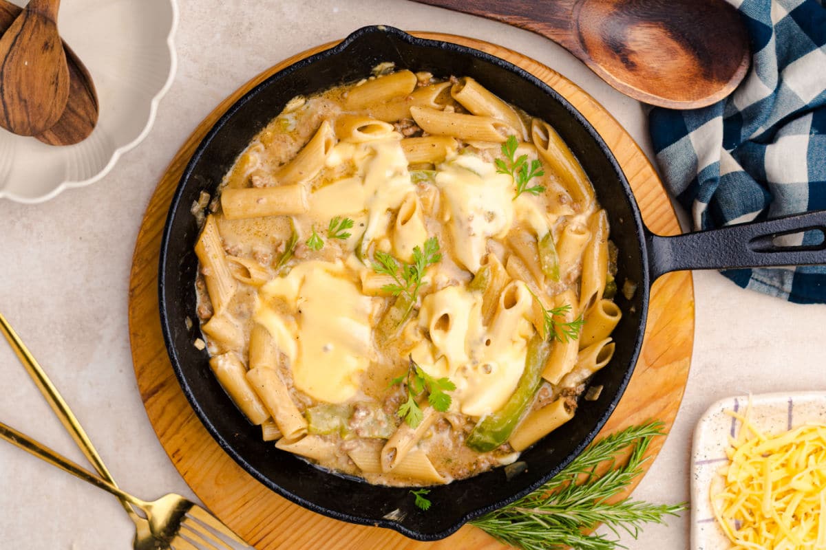 adding remaining slices or shreds of Provolone cheese.