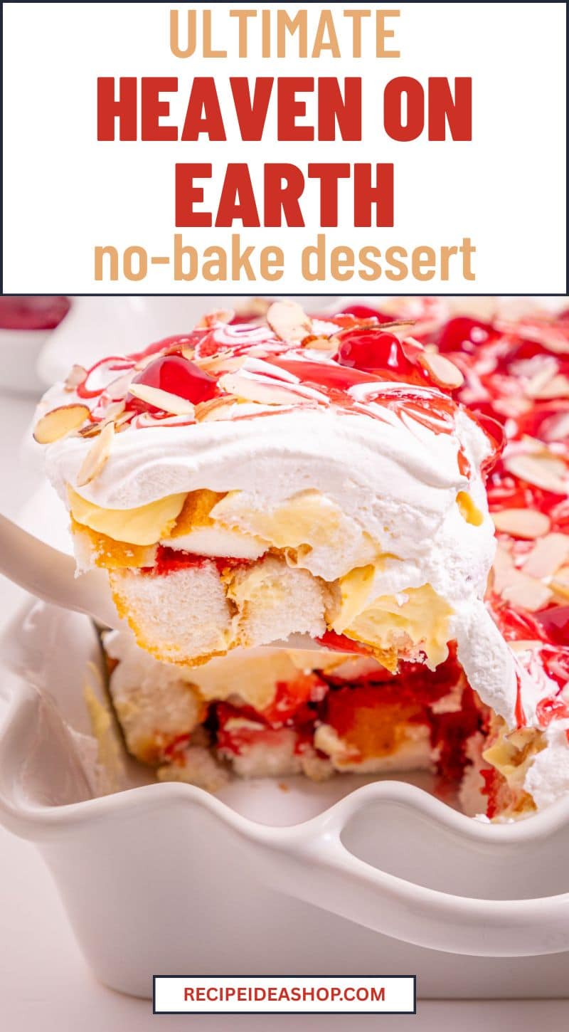 A close-up of a Heaven On Earth Cake no-bake dessert with layers of cake, cream, and fruit filling being served from a white dish. The dessert is finished with whipped cream and a cherry sauce drizzle. Text reads Heaven on Earth no-bake dessert.