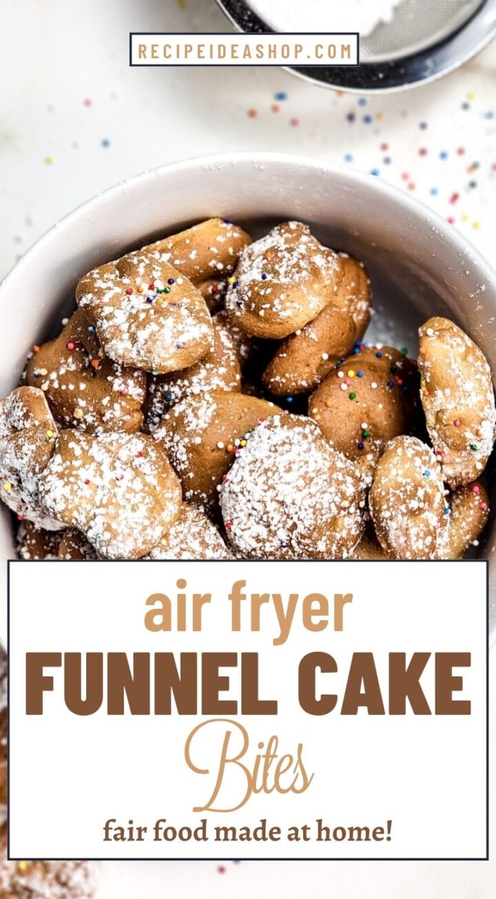 A white bowl filled with Air Fryer Funnel Cake Bites, topped with powdered sugar and colorful sprinkles, sits on a white surface. Text on image reads: “Air Fryer Funnel Cake Bites – fair food made at home.”.